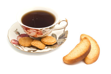 cup of tea, cookies and pair of crackers
