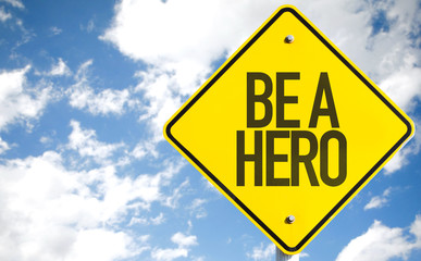 Be a Hero sign with sky background