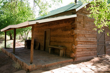 Fototapeta na wymiar Log cabin in Lonely Dell Ranch National Historic District at Lee's Ferry in Arizona