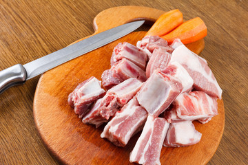 Raw pork ribs on a cutting board