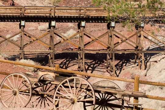 Old wagon and train trestle in Calico Ghost Town, owned by San Bernardino County, California