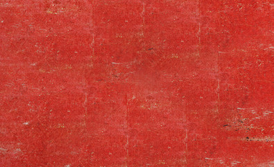 wall of shabby paint and plaster cracks