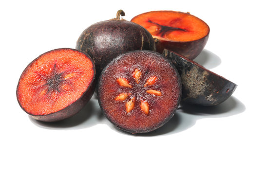 Flacourtia fruit over white background
