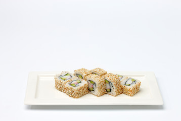 Sushi on white plate.