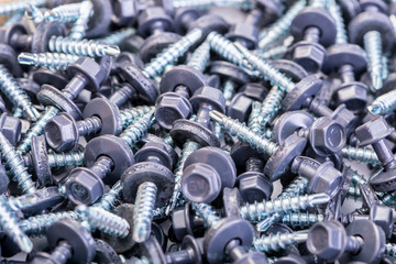Many screws arranged as background