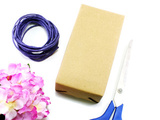 wrapping presents and accessories on white background