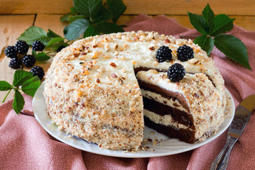 Homemade chocolate cake and cheese butter cream in rustic style