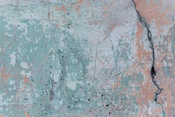 Obraz na płótnie Canvas Wall fragment with attritions and cracks