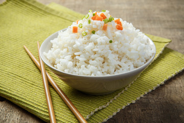 Japan rice with chopsticks on a fabric mat