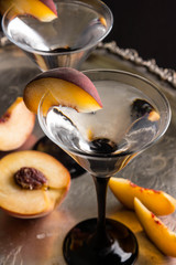 Vodka and martini with fresh peaches