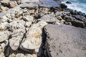 Old and eroded dam to the Black Sea