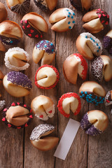 fortune cookies decorated with candy sprinkles closeup. vertical top view
