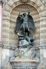 statues of Fountain Saint Michel in Paris