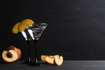 Vodka and martini with fresh peaches