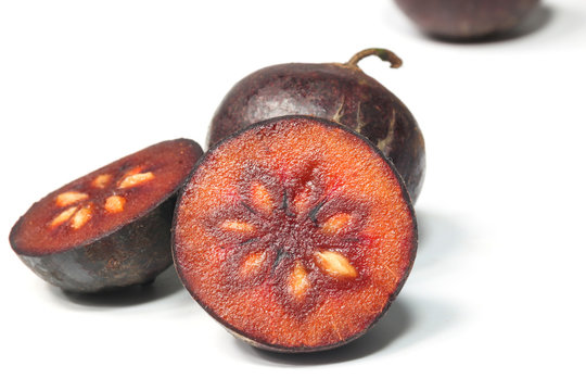 Flacourtia fruit on white background
