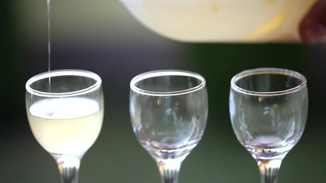 Close-up of schnapps Poured into a Shot Glass
