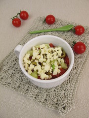 Crumble mug cake with tomatoes, cucumber, olives and feta crumbles from microwave