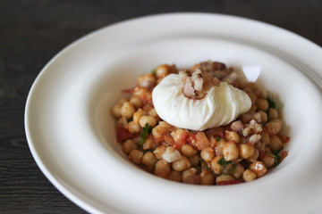 sharp spicy chickpeas and the poached eggs with fried bacon