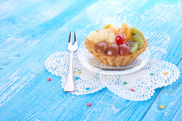 sweet cake with fruits on plate