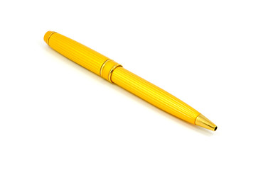 Golden pen on white background