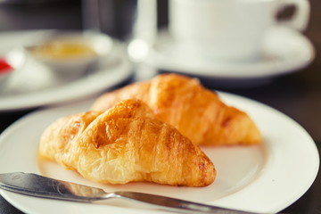 Croissant Breakfast served with black coffee