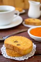 Fresh baked biscottis with raisins and apricot jam