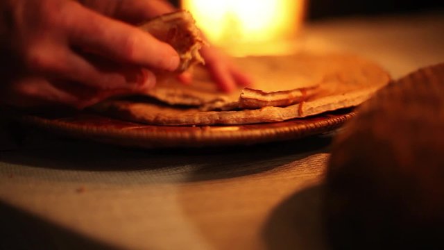 Breaking Bread for Communion Pan Shot