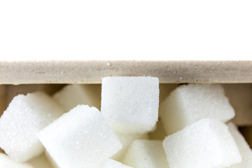 Aerial View of Sugar Cubes in Square Shaped Bowl on Isolated White Background