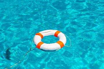 Naklejka premium Life buoy in swimming pool