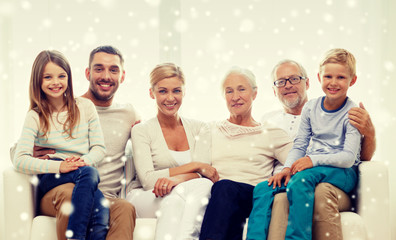 happy family sitting on couch at home