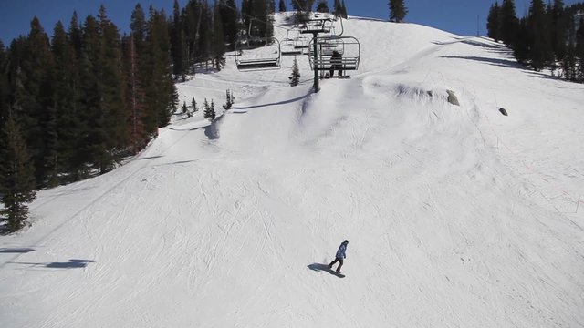 Riding a Ski Lift Wide Shot
