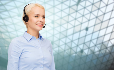 helpline operator in headset over grid background