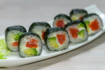 Close-up  Maki sushi arranged on plate, shallow depth of field,
