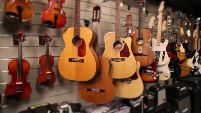 Guitars and Violins Wide Shot Pan