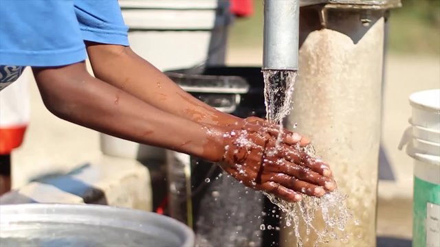 Washing Hands at Well Slow Motion