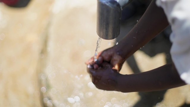 Wash Hands at Well Super Slow Motion