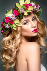 Beautiful woman with flowers in hair
