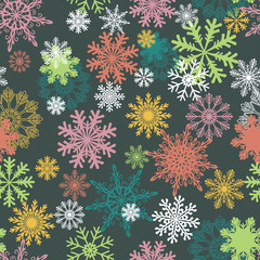 Seamless winter background with snowflakes. Colorful Christmas pattern.