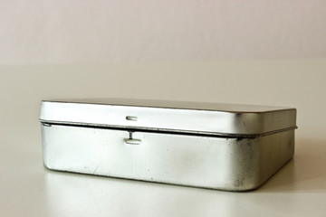 The Little Metal Box on the White Background
