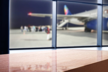 desk and window of airport 