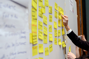Business people meeting at office and use post it notes to share idea