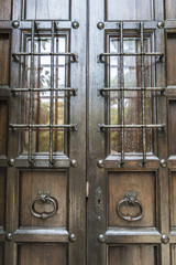 Naklejka premium Old barred door