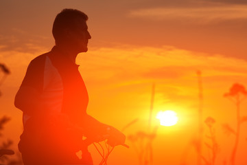 Fototapeta premium Man riding a bicycle in nature 