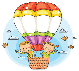 Cartoon kids travelling by air with copy space across the balloon