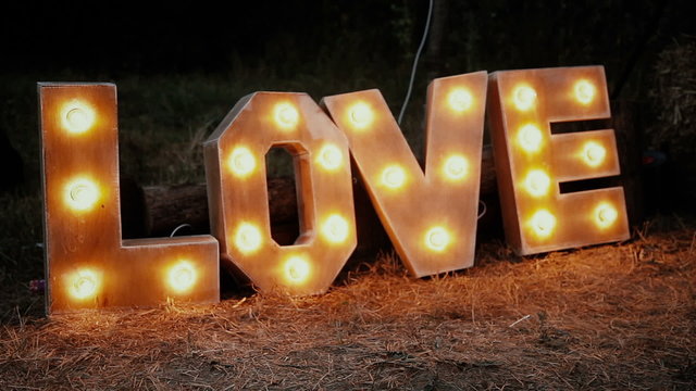 The word love highlighted bulbs