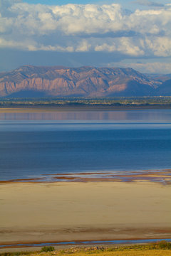 Great Salt Lake and Wasatch Mountains in evening from Antelope Island State Park in Utah