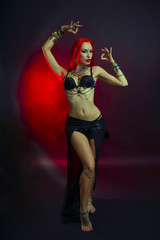 Bellydancer - Beautiful Woman in Sexy Clothing with Eastern Make