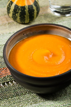Pumpkin soup in a ceramic bowl