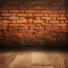 Grungy brick wall with wooden floor