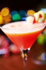 red tropical alcohol cocktail or lemonade with decoration.